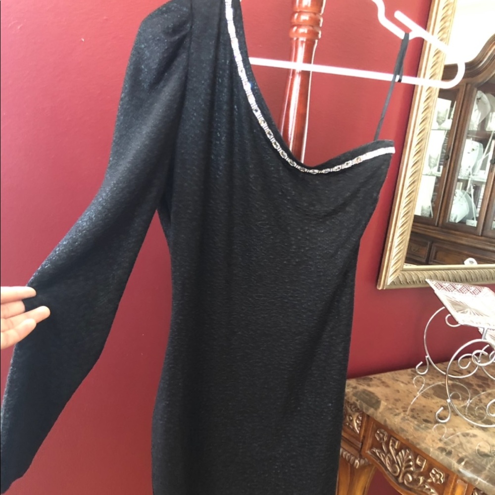 One sleeve black dress with stone design.